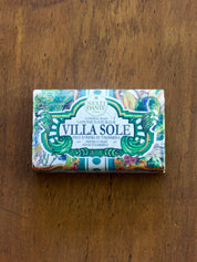 Nesti Dante Villa Sole Soap bar of soap with 'Villa Sole' packaging on a wooden surface