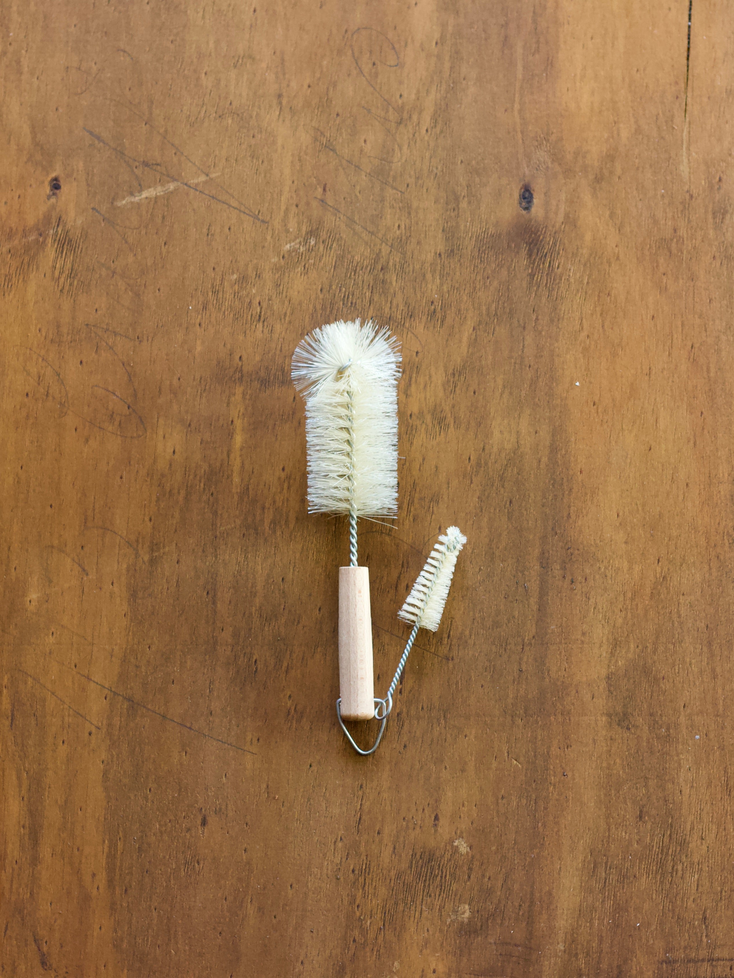 Bottle Brush | Dual set with a wooden handle on a wooden surface