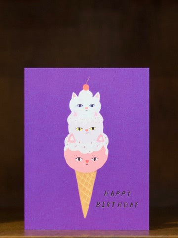 Carolyn Suzuki birthday greeting card with three cat faces on top of an ice cream cone.