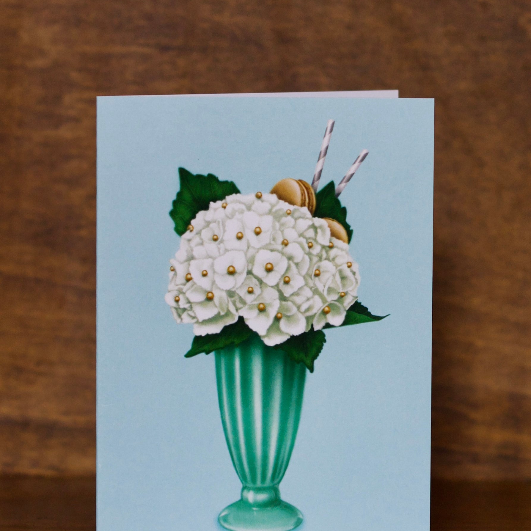 All occasions greeting card with a floral design on a wooden surface