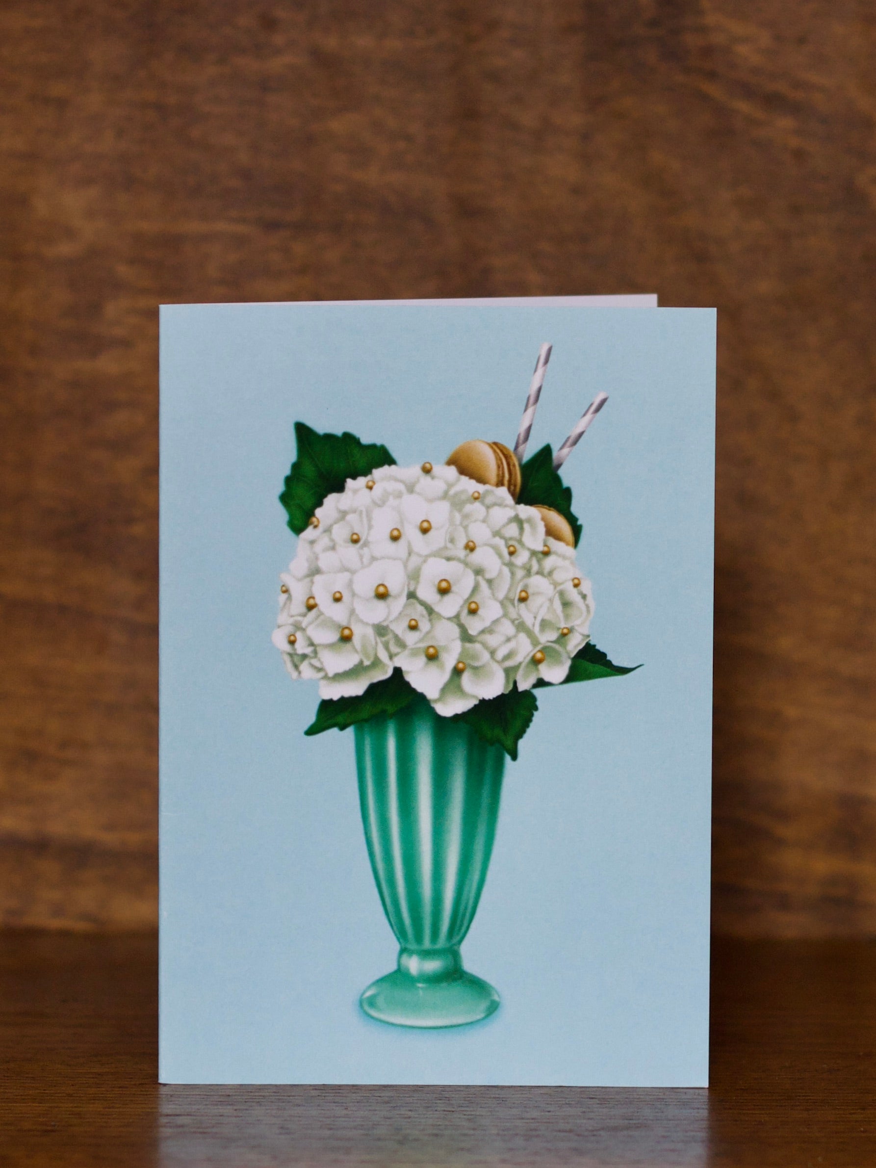All occasions greeting card with a floral design on a wooden surface
