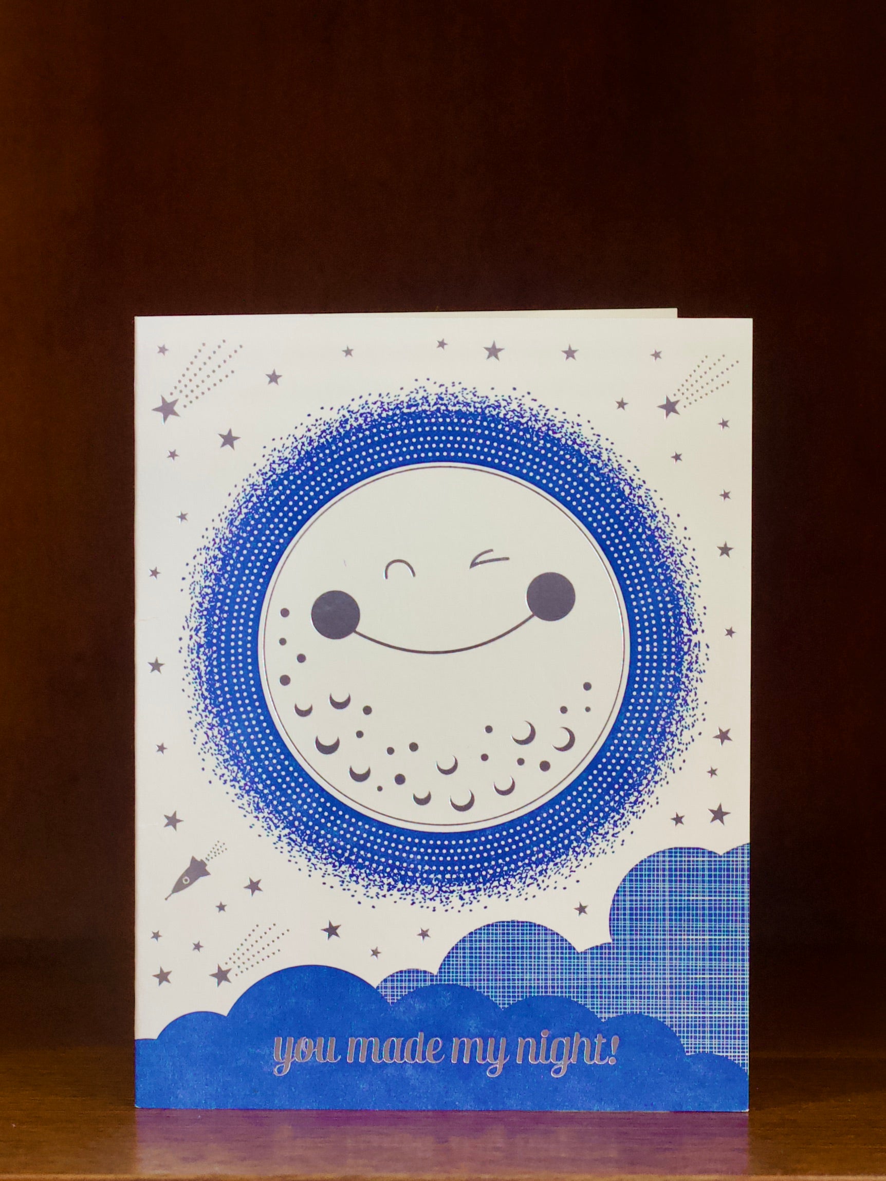 Greeting card with a blue moon design and 'you made my night!' text on a dark background