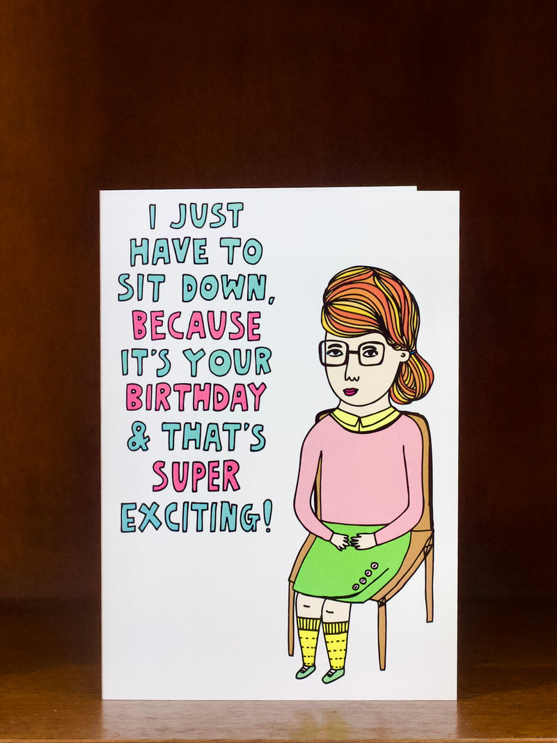 Birthday card with a colorful illustration of a person and humorous text on a white background.