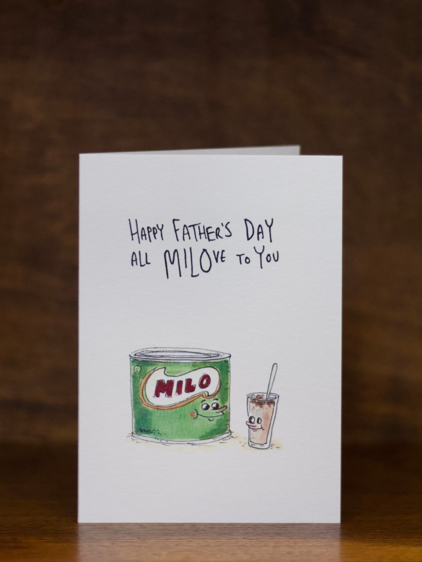 Father's Day greeting card with Milo illustration and text on a dark background