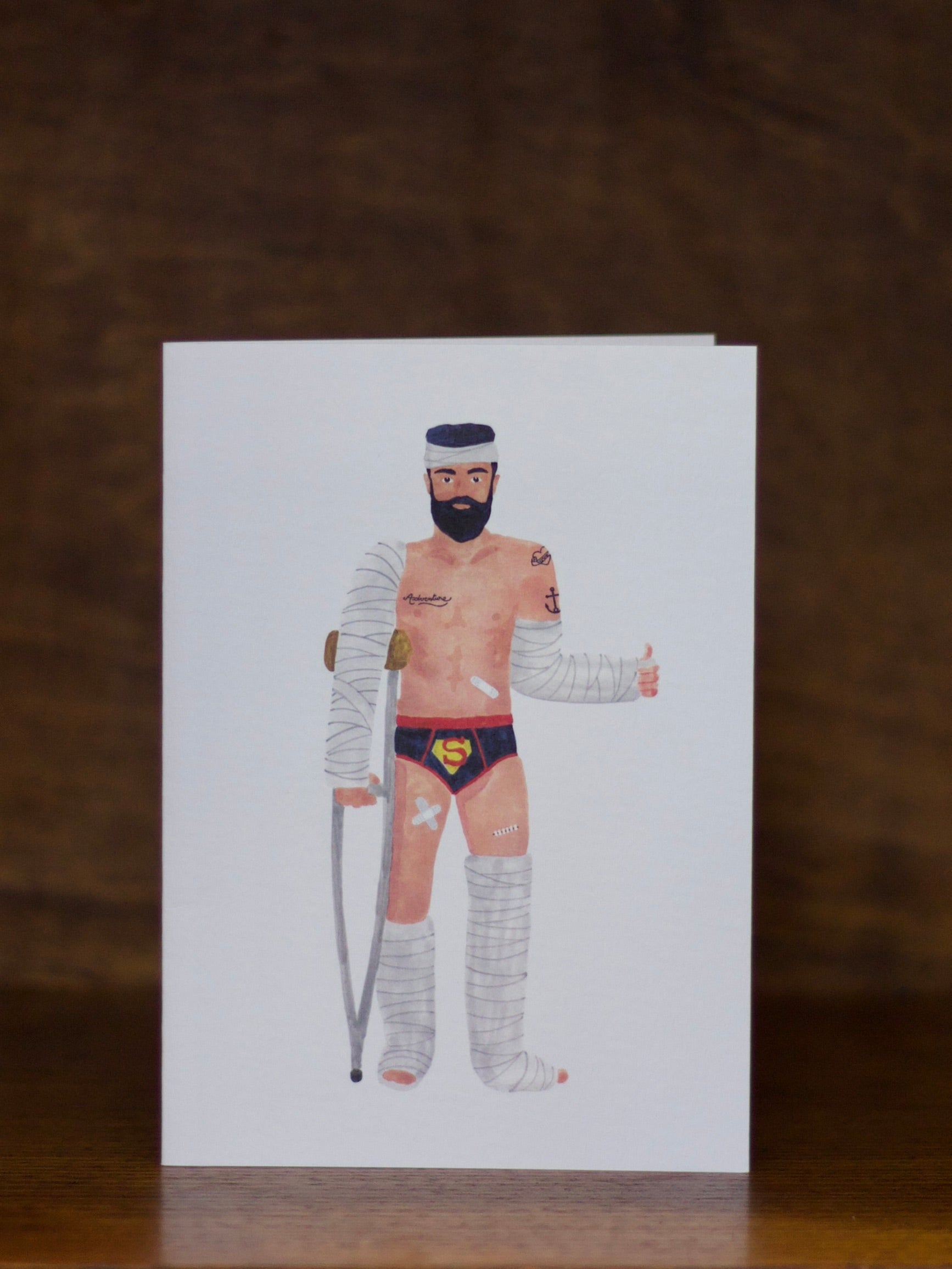 Get well soon greeting card with a illustrated character on a white background