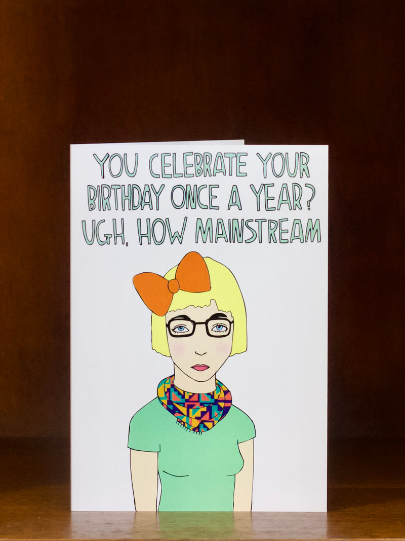 Birthday card with a cartoon character and humorous text on a white background