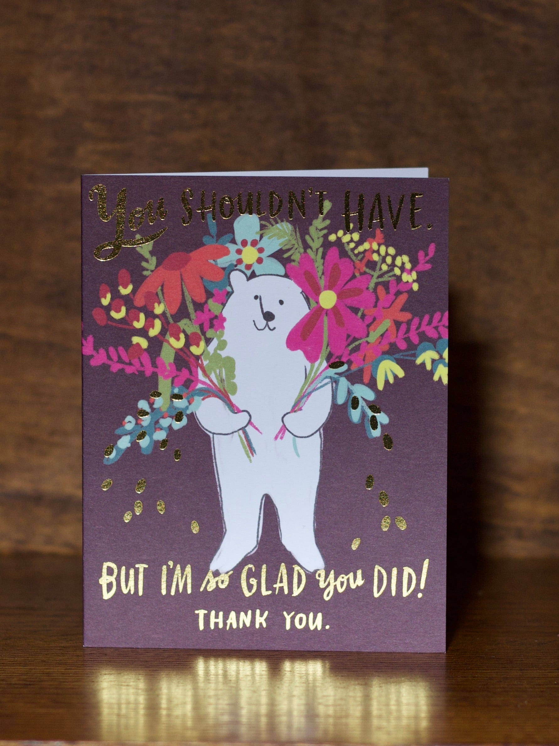 Thank you greeting cards with a bear illustration and floral elements on a dark background