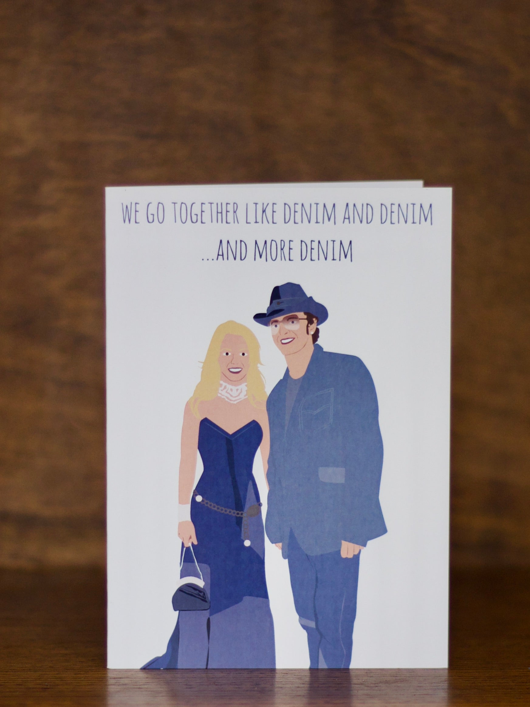 Love & Friendship greeting card with illustration of a couple in blue outfits and text 'We go together like denim and denim.