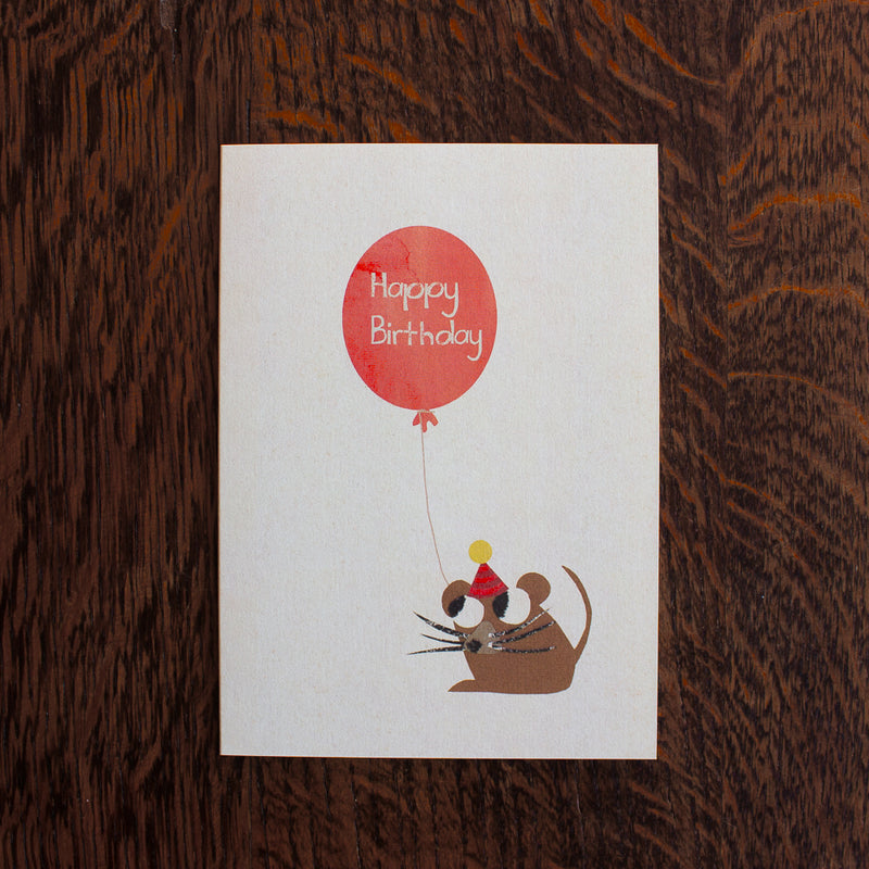 Florence Fry birthday greeting card with a mouse holding a red balloon on a wooden surface