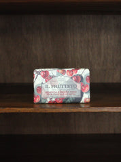 Nesti Dante Il Frutteto bar of soap with cherry design packaging on a wooden surface
