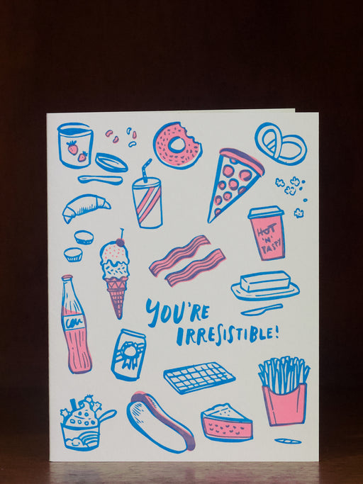 Love greeting card with food illustrations and 'You're Irresistible!' text on a white background