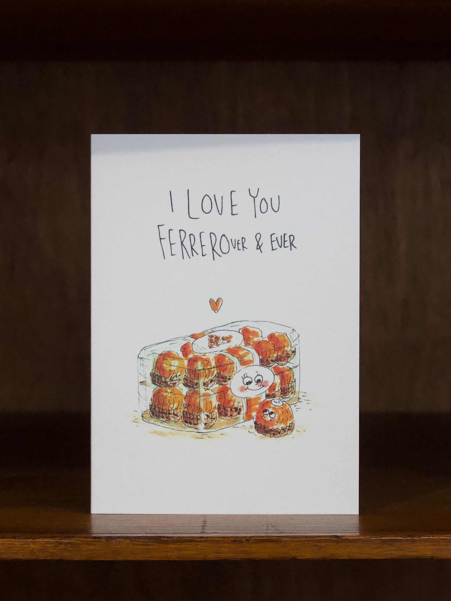 Well Drawn greeting cards with illustration of a box of chocolates and text 'I Love You Ferrerour & Ever' on a wooden surface.