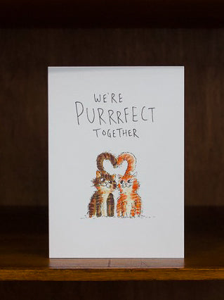 Well Drawn greeting card with two cats forming a heart and text 'We're Purrrfect Together' on a white background.