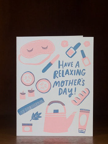 Mother's Day greeting card with 'Have a Relaxing Mother's Day!' text and various icons on a dark background
