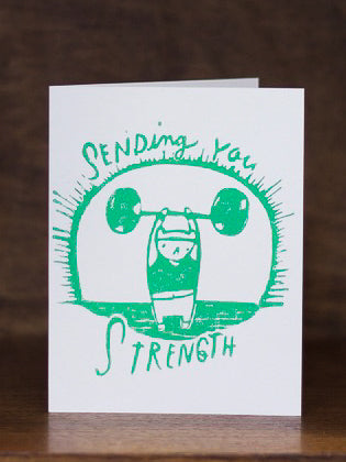 Sympathy greeting cards by Ghost Academy with green illustration of a person lifting weights and text 'Sending You Strength' on a white background.
